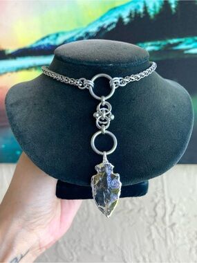 Crystal quartz arrow on stainless steel maille celtic knot lariat Y necklace.